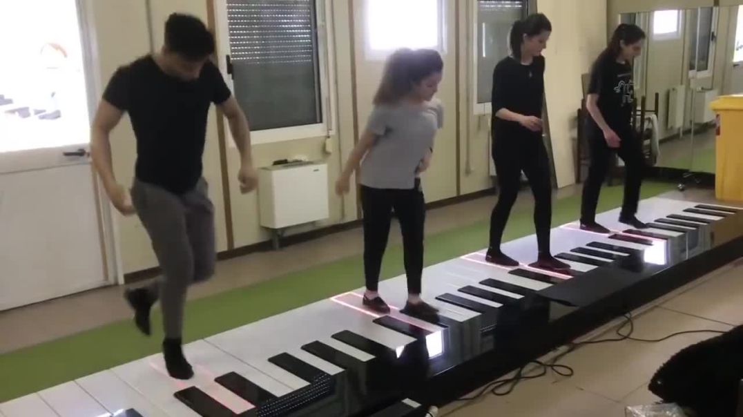 DESPACITO Dancing and Playing By Foot Piano